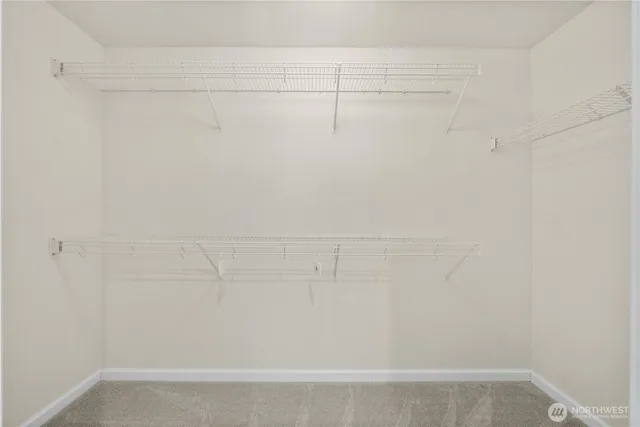 a bathroom with a sink double vanity and a mirror