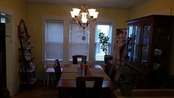 16 Hovey Road Waltham, MA 02453 - Photo 7 of 10 a view of a dining room with furniture and chandelier