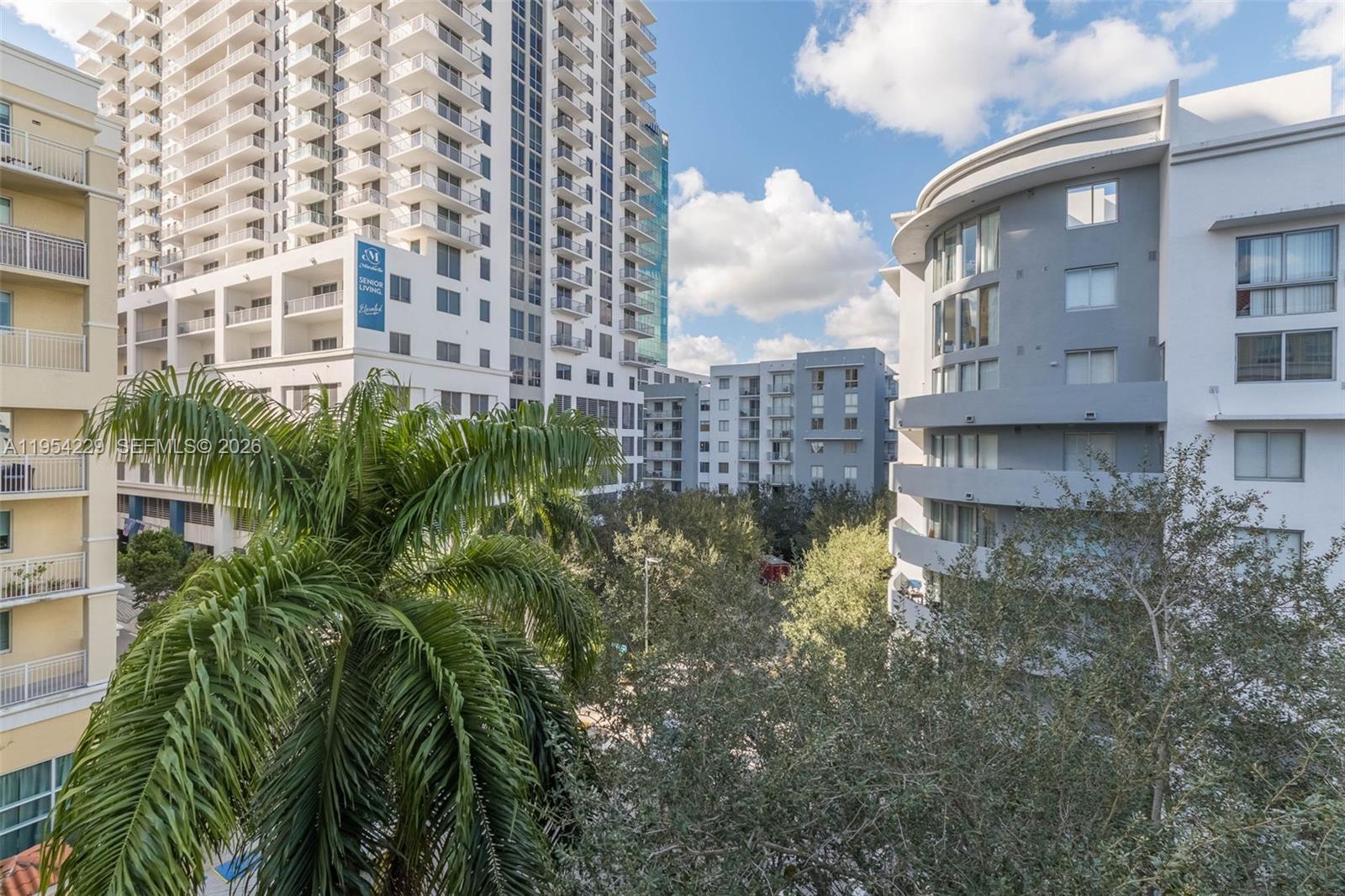 7355 Southwest 89th Street, Unit 502N Miami, FL 33156 - Photo 15 of 15 a view of a large building