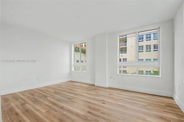 an empty room with windows