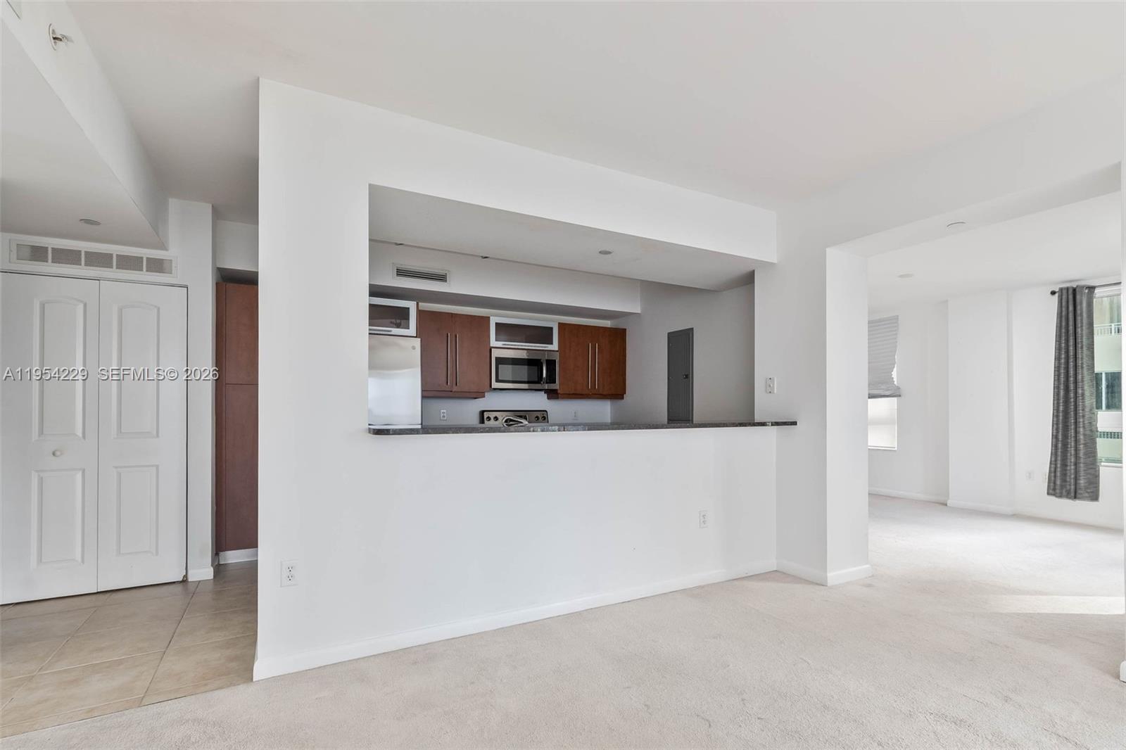 7355 Southwest 89th Street, Unit 502N Miami, FL 33156 - Photo 10 of 15 a view of a living room with furniture