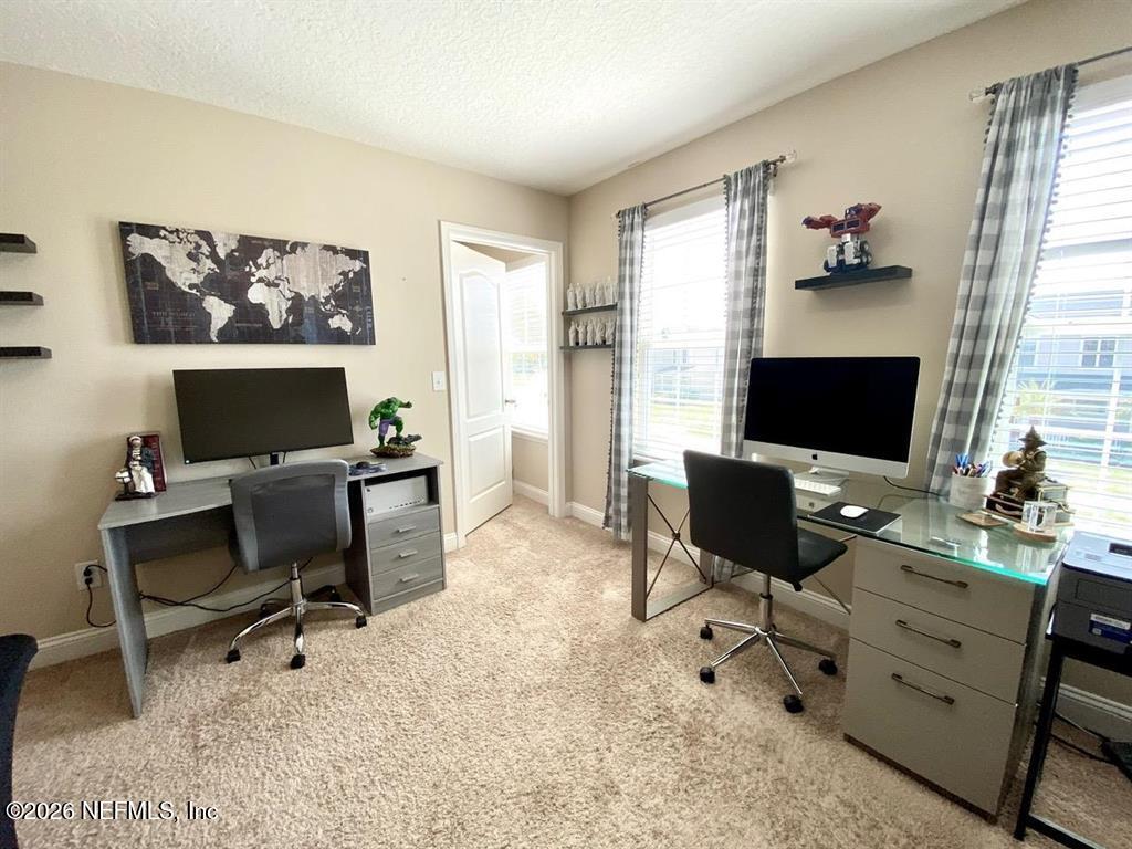 115 Sierras Loop St. Augustine, FL 32086 - Photo 41 of 65 a workspace with furniture and a window