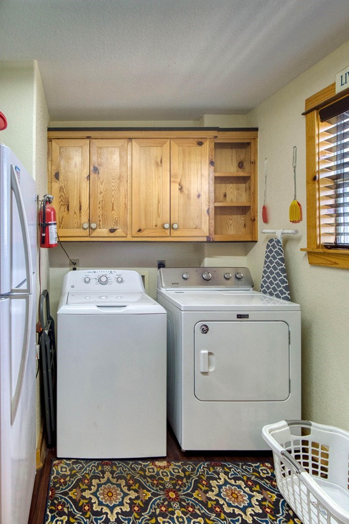 6446 Blackjack Road Fredonia, TX 76842 - Photo 37 of 48 a view of utility room with washer and dryer