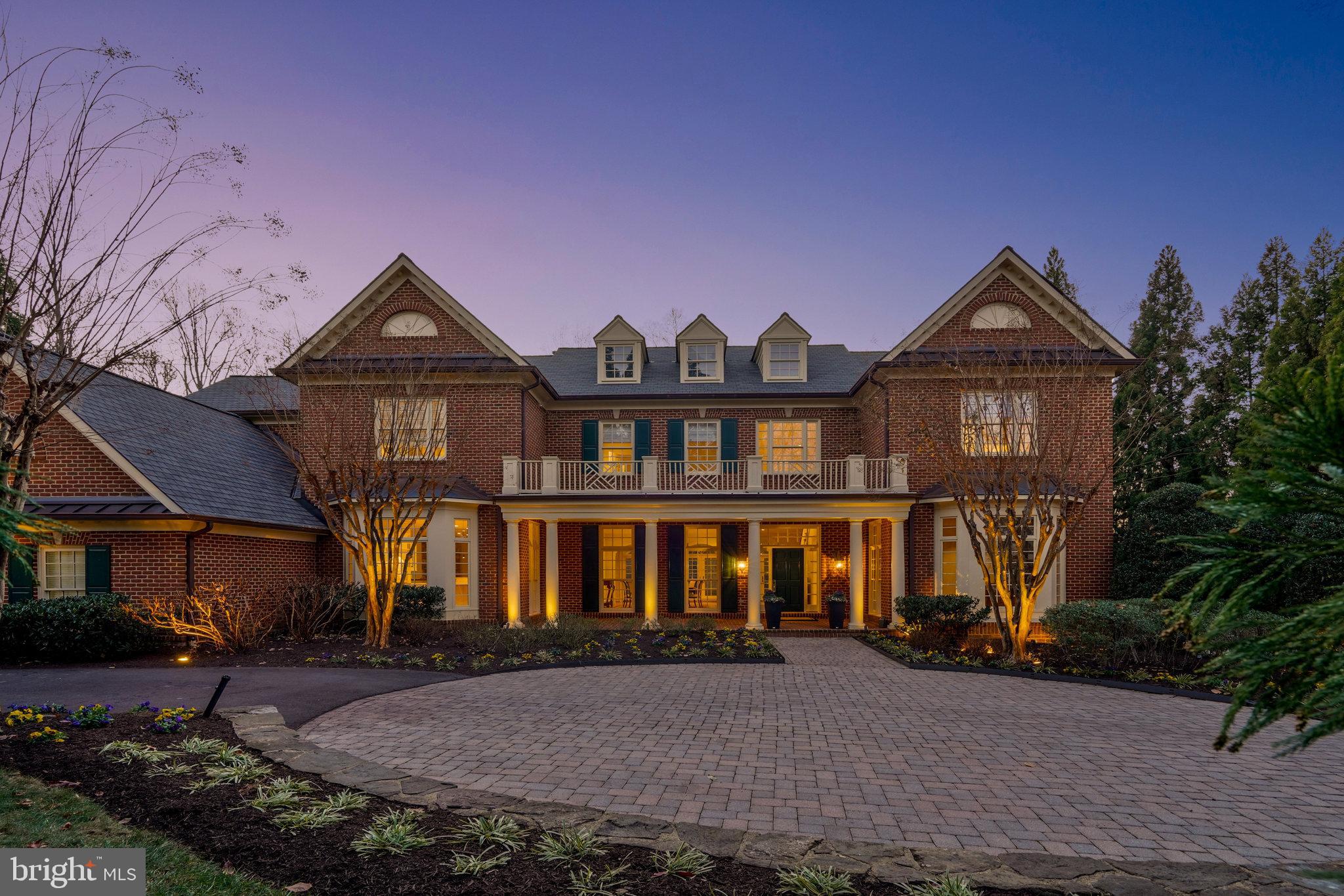 1064 Silent Ridge Court McLean, VA 22102 - Photo 1 of 70 a front view of a house with garden