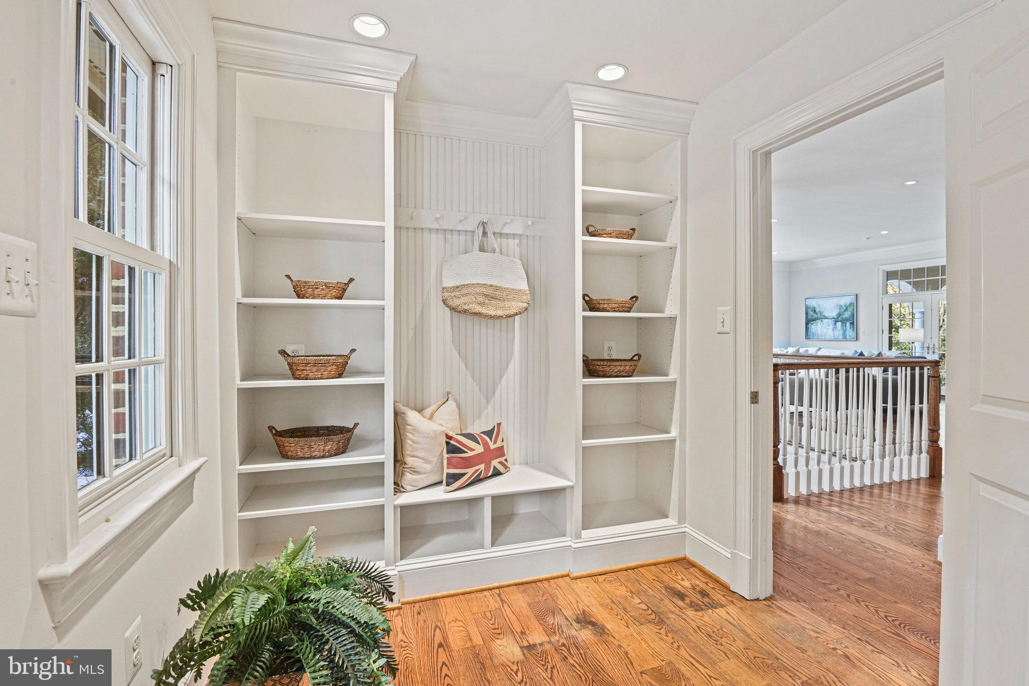 1064 Silent Ridge Court McLean, VA 22102 - Photo 22 of 70 a view of a livingroom with wooden floor and a window
