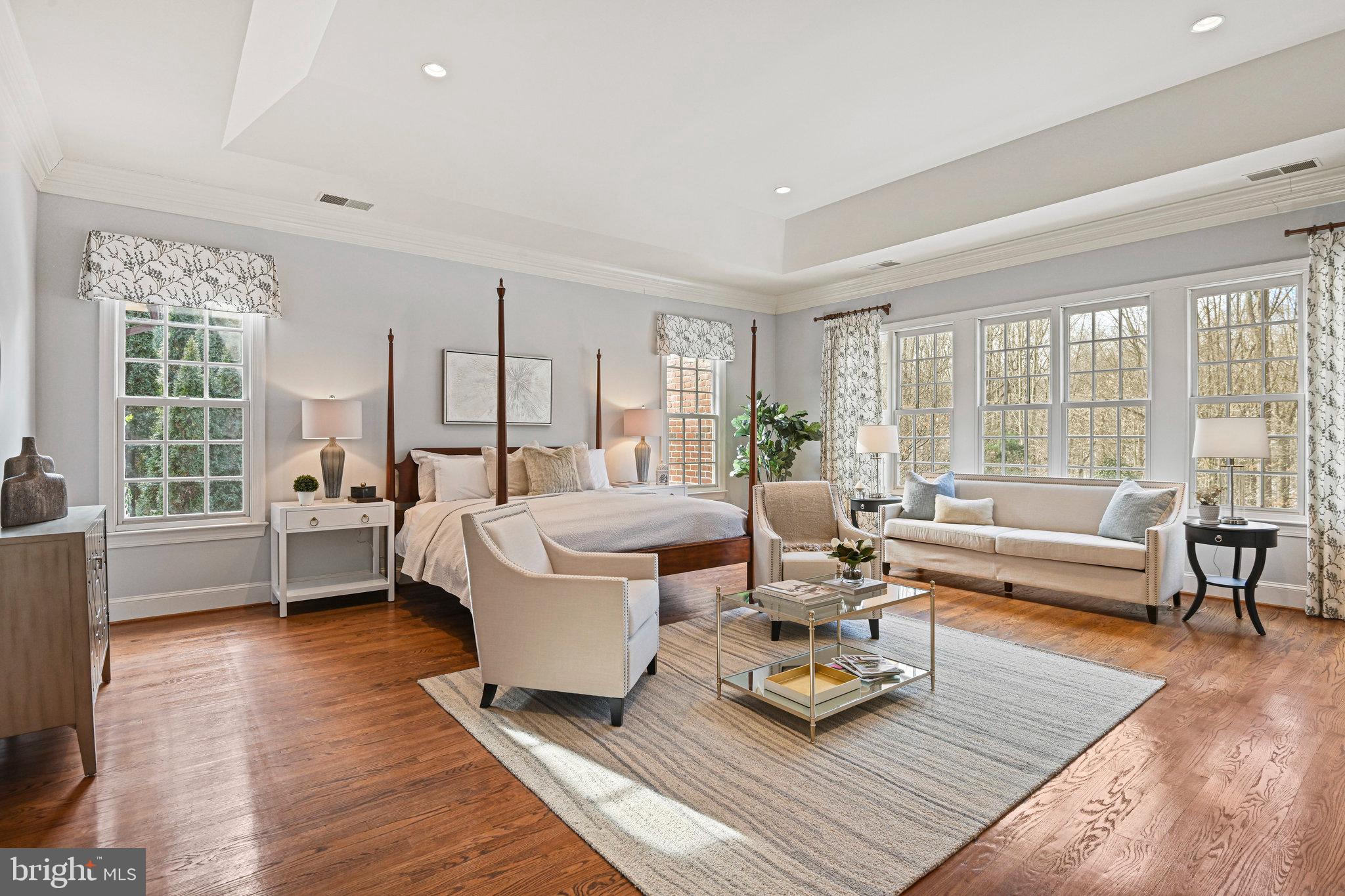 1064 Silent Ridge Court McLean, VA 22102 - Photo 25 of 70 a living room with furniture and a large window