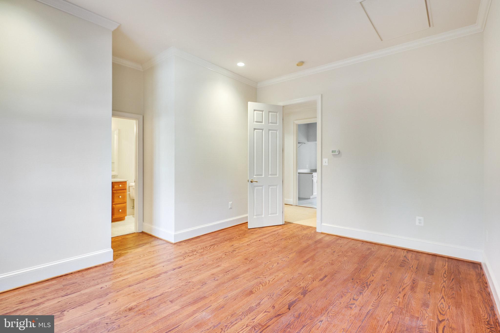 1064 Silent Ridge Court McLean, VA 22102 - Photo 34 of 70 a view of an empty room with wooden floor
