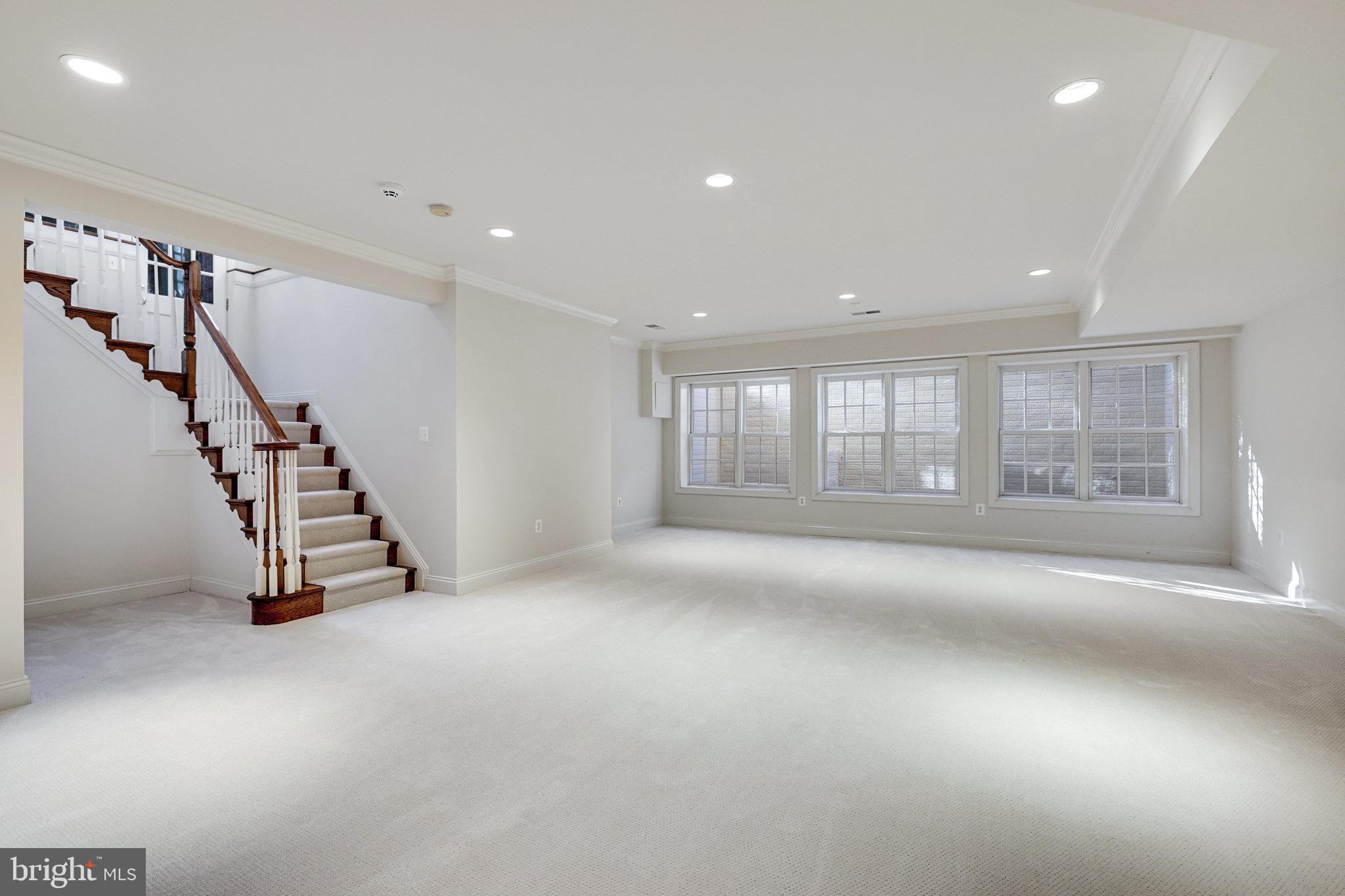 1064 Silent Ridge Court McLean, VA 22102 - Photo 45 of 70 a view of an empty room with stairs