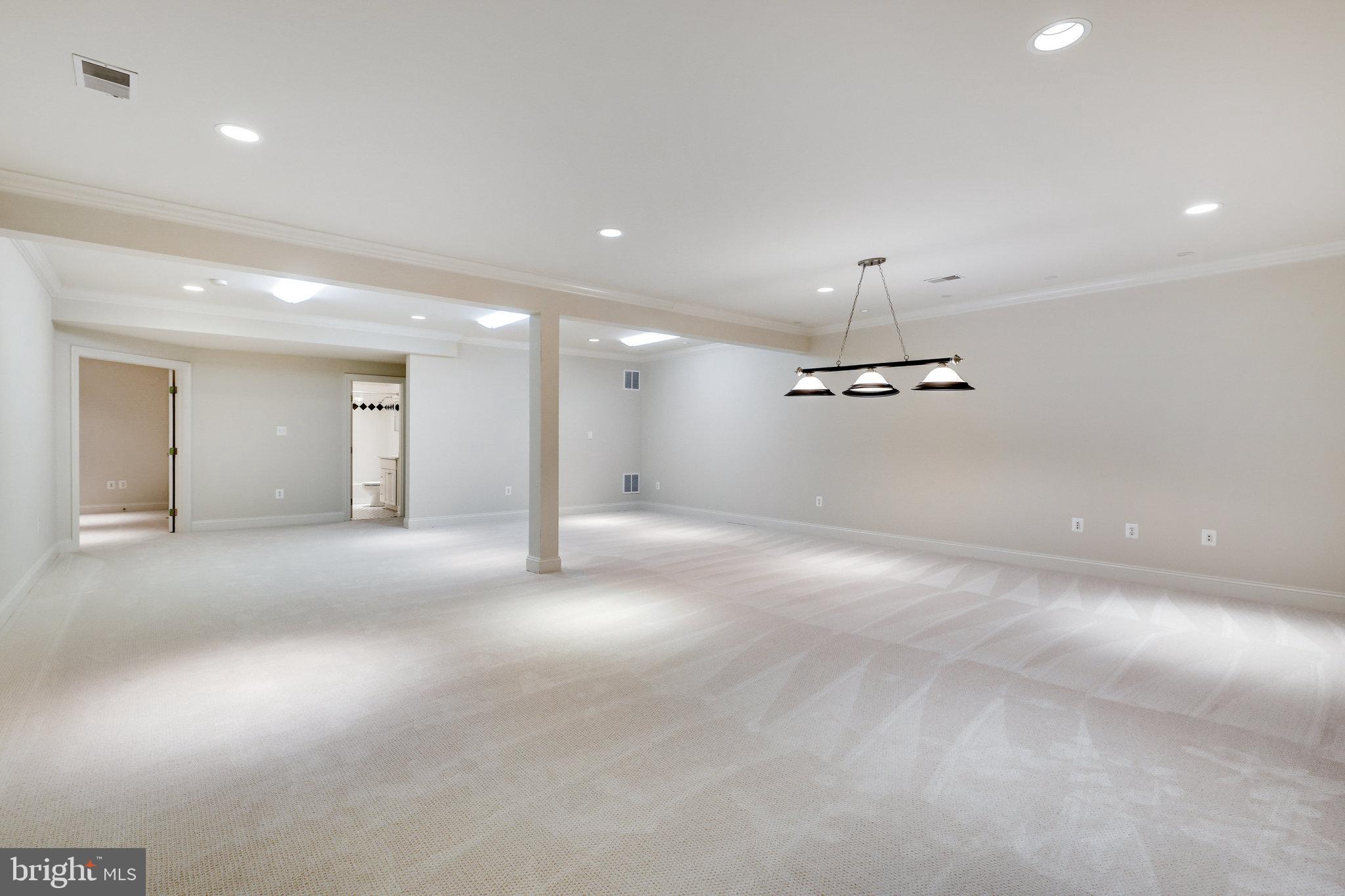 1064 Silent Ridge Court McLean, VA 22102 - Photo 52 of 70 a view of a livingroom and a kitchen