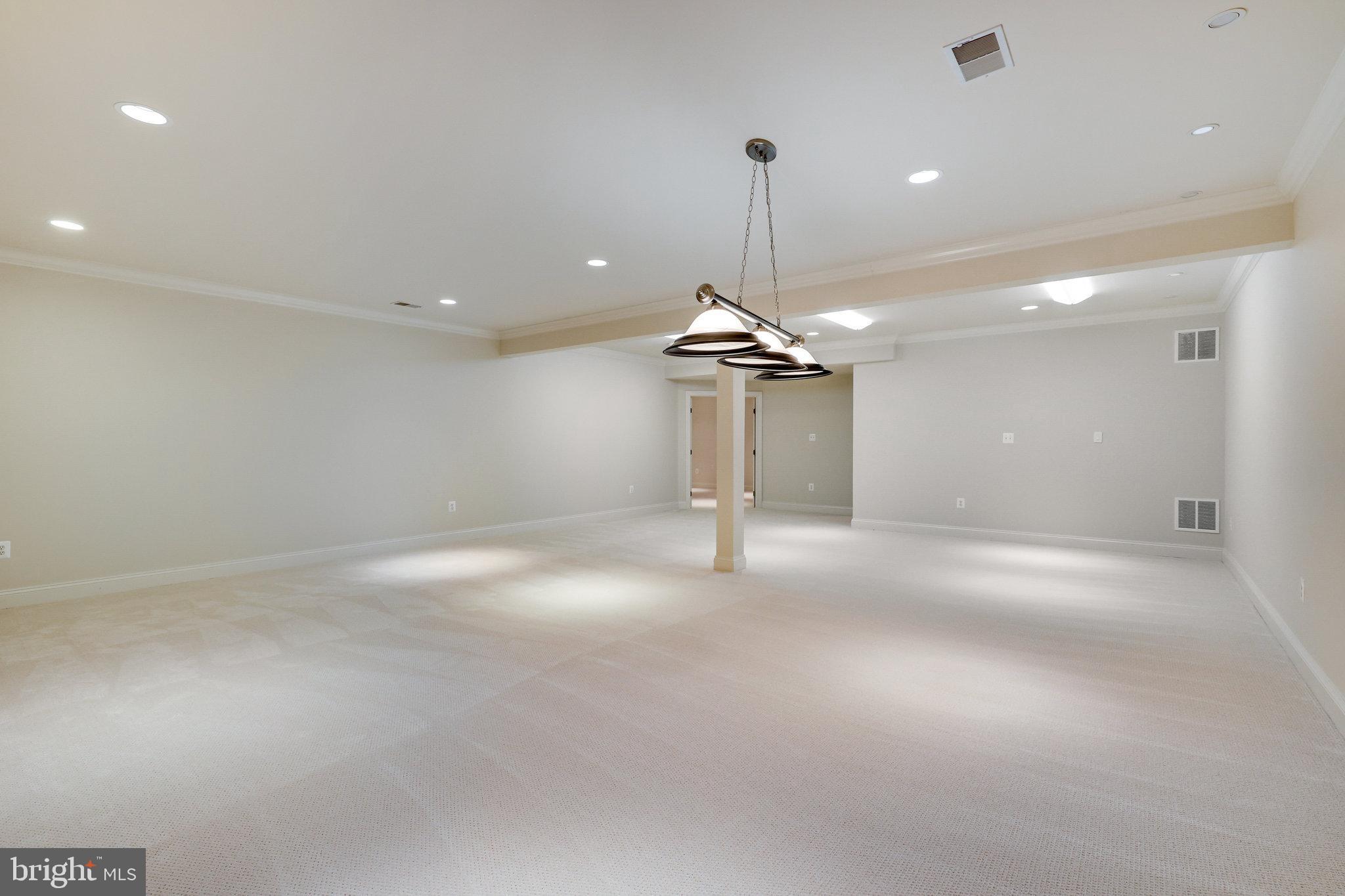 1064 Silent Ridge Court McLean, VA 22102 - Photo 53 of 70 a view of empty room with a ceiling fan