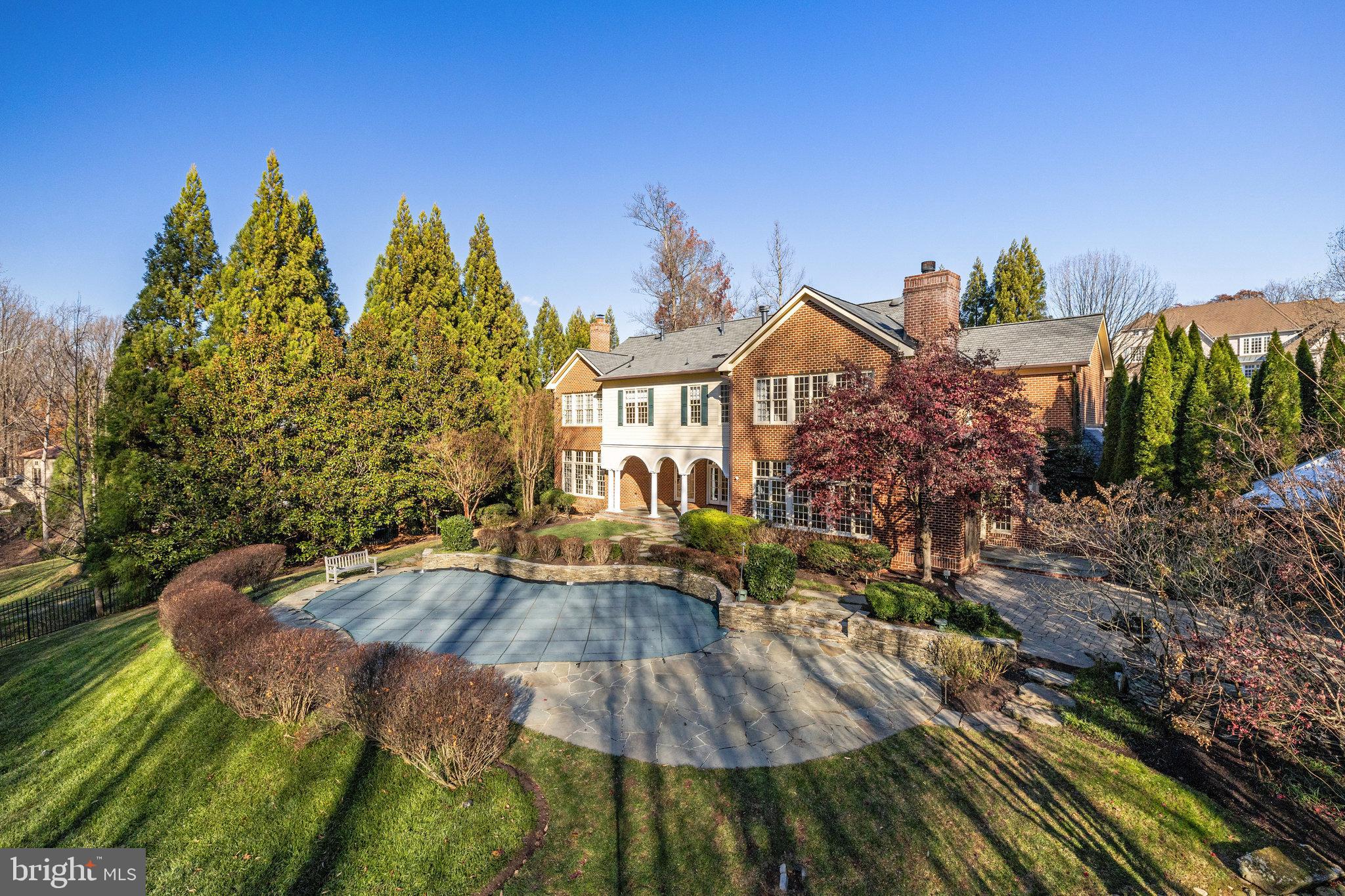 1064 Silent Ridge Court McLean, VA 22102 - Photo 59 of 70 a view of a house with backyard and trees