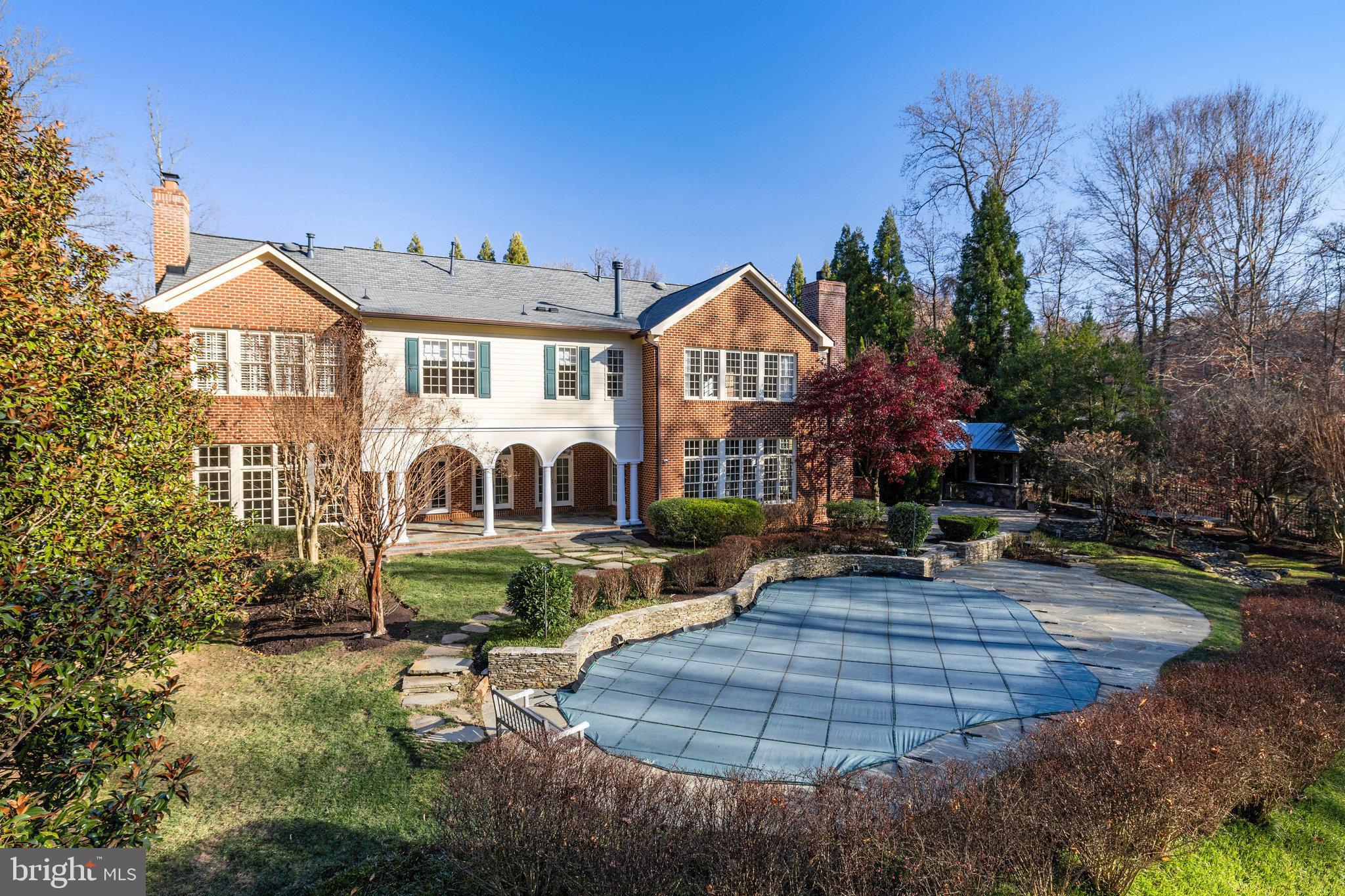 1064 Silent Ridge Court McLean, VA 22102 - Photo 60 of 70 a front view of a house with garden