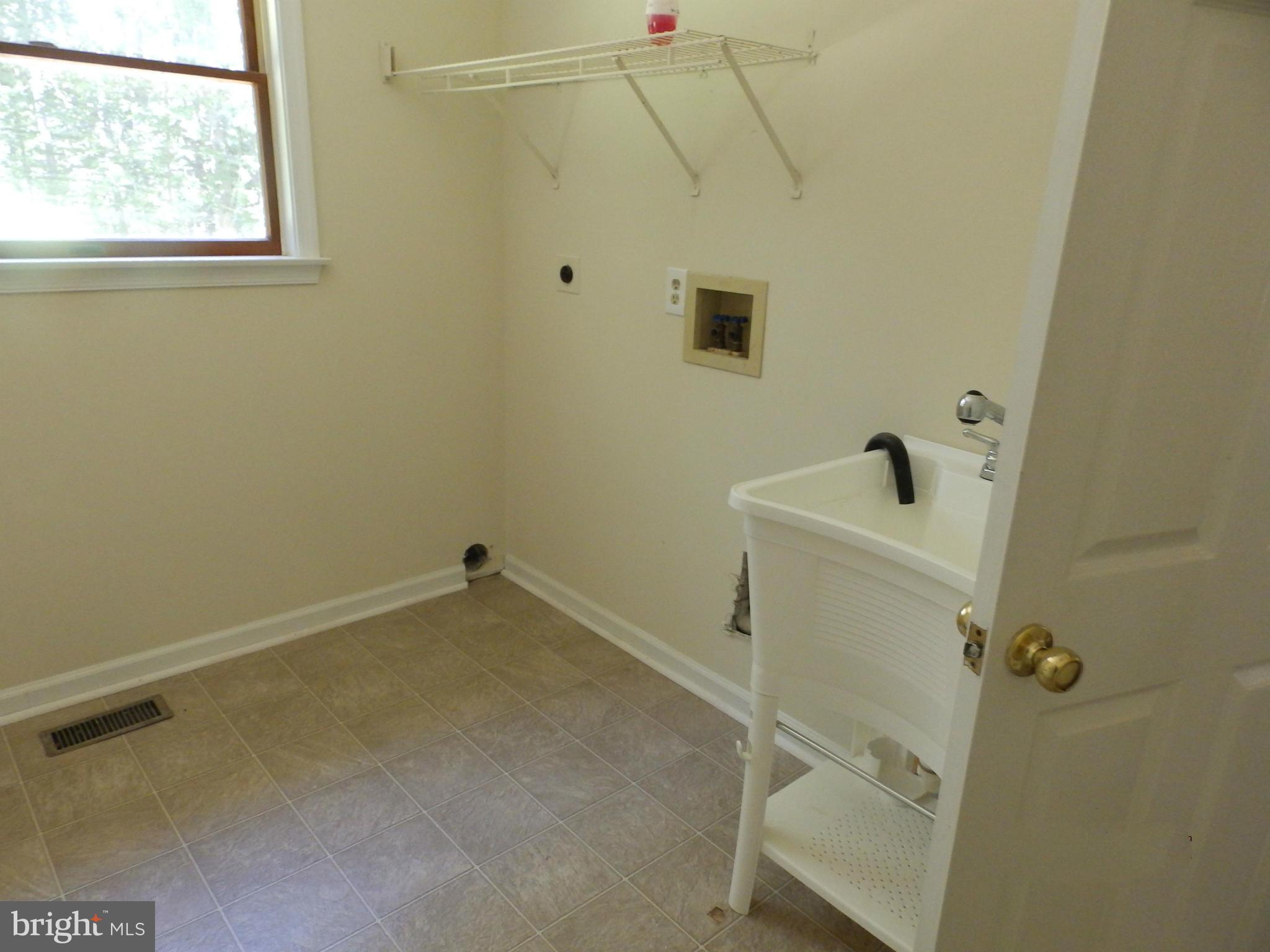 5250 Hoffmanville Road Manchester, MD 21102 - Photo 12 of 29 a bathroom with a sink and toilet