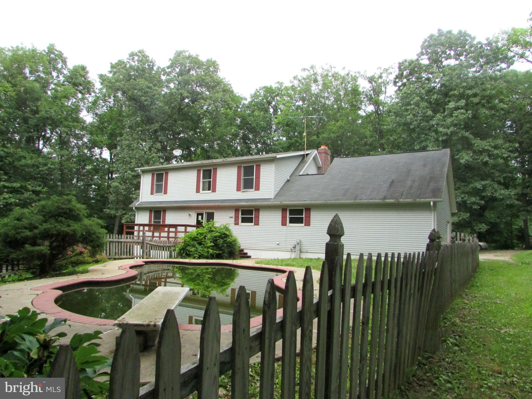 5250 Hoffmanville Road Manchester, MD 21102 - Photo 25 of 29 a view of a house with backyard and sitting area
