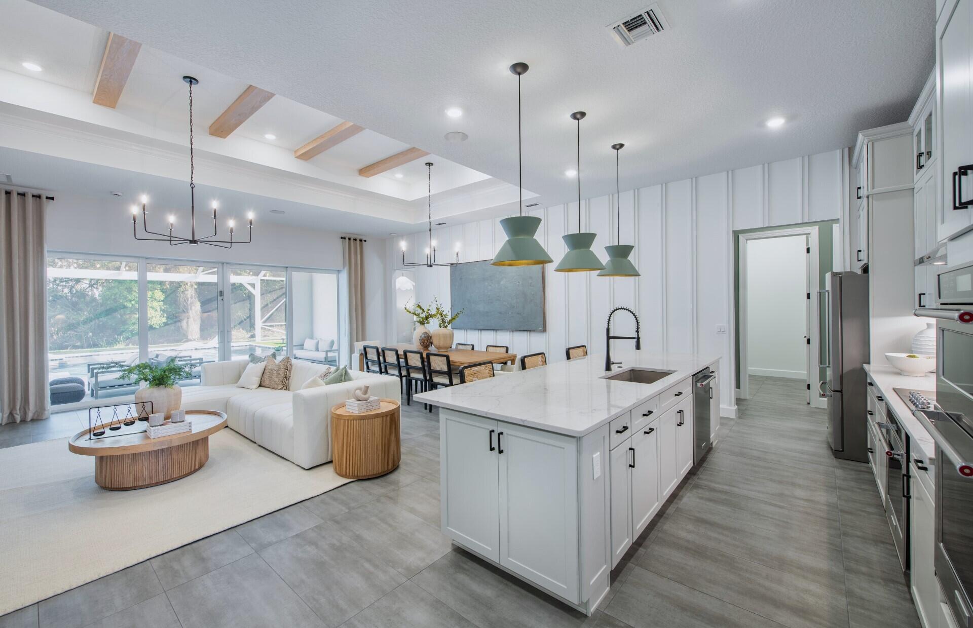4425 Southwest Cornerstone Way, Unit ASHBY 169 Stuart, FL 34997 - Photo 7 of 26 Kitchen and Gathering - Ashby Model Home
