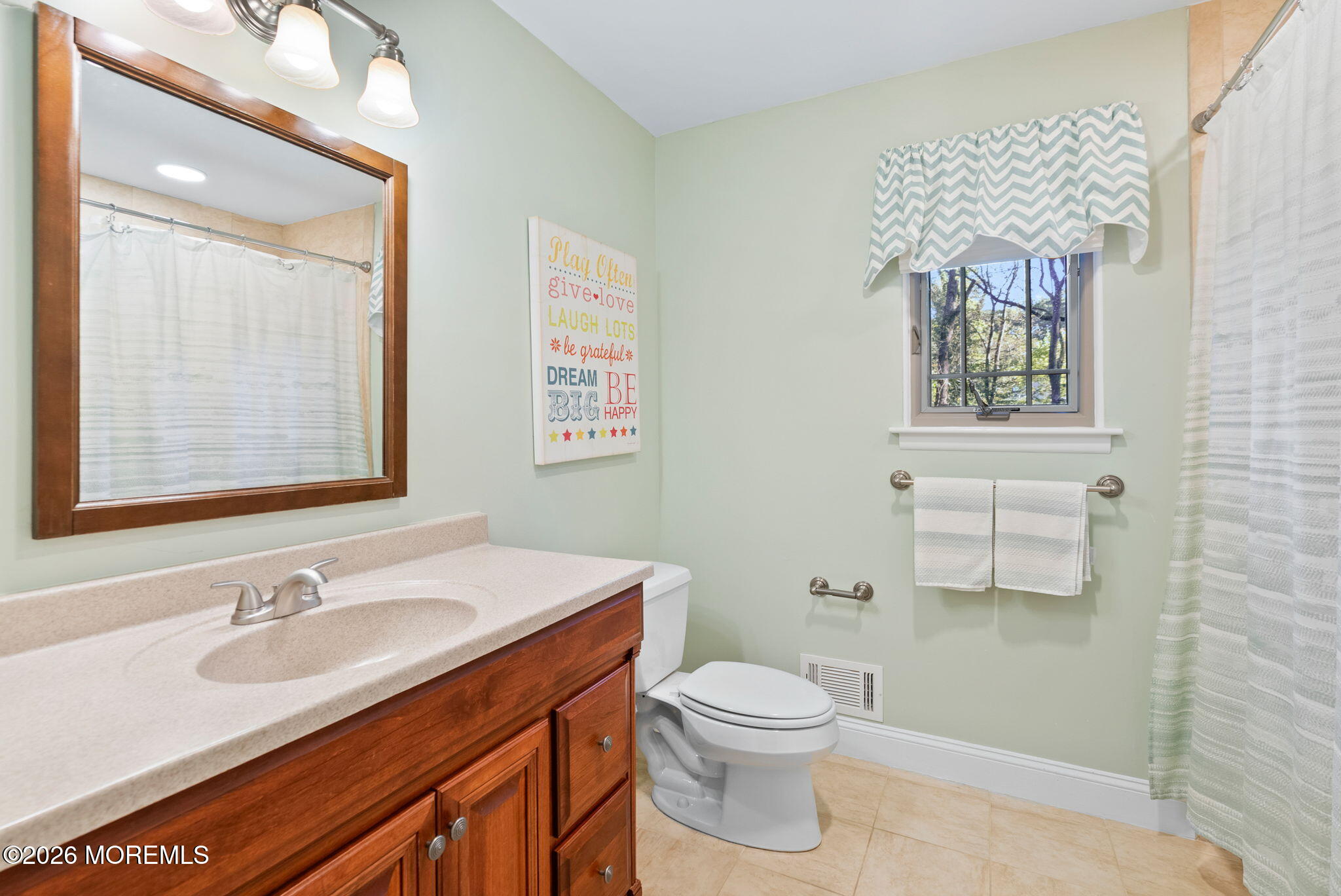21 Stoney Brook Road Holmdel, NJ 07733 - Photo 27 of 40 a bathroom with a granite countertop sink toilet and mirror