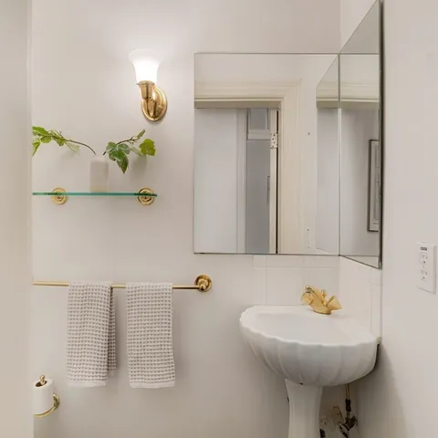 a view of a lake with houses in the background