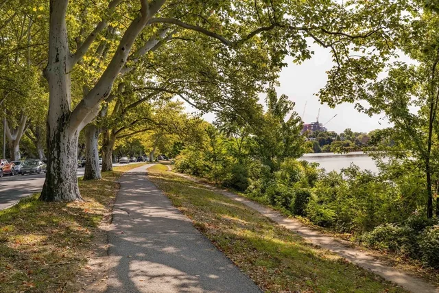 a view of a building next to a yard