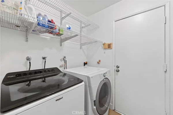 a stove top oven sitting inside of a kitchen