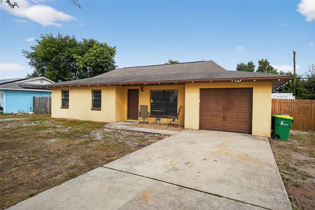 1644 Ruth Street Cocoa, FL 32926 - Photo 33 of 38 a front view of a house with garden