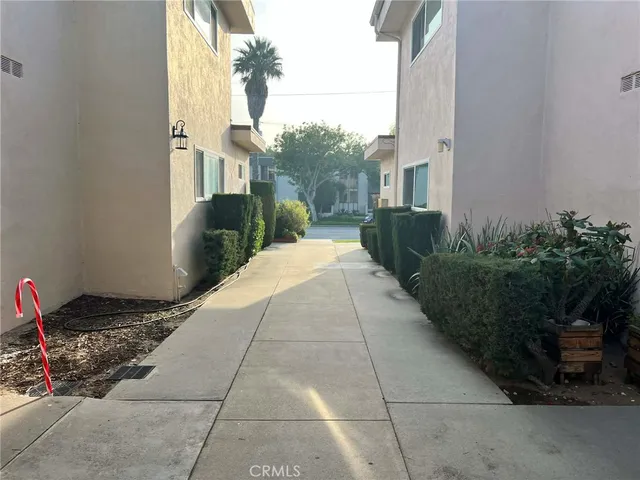 a view of a backyard of the house