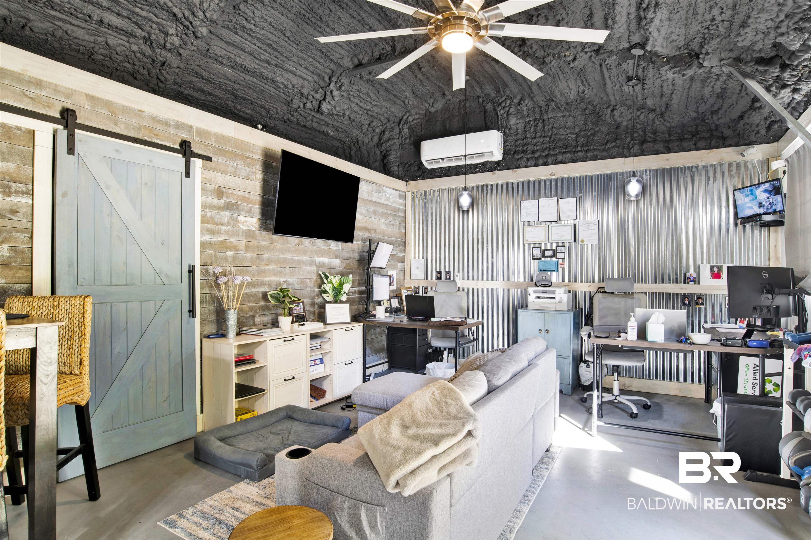 605 Van Avenue Daphne, AL 36526 - Photo 31 of 37 Interior space with a wall mounted AC, a barn door, and ceiling fan