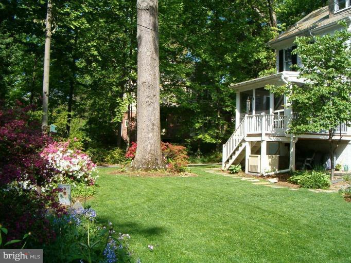 5103 Woodside Road Baltimore, MD 21229 - Photo 24 of 30 a front view of a house with garden