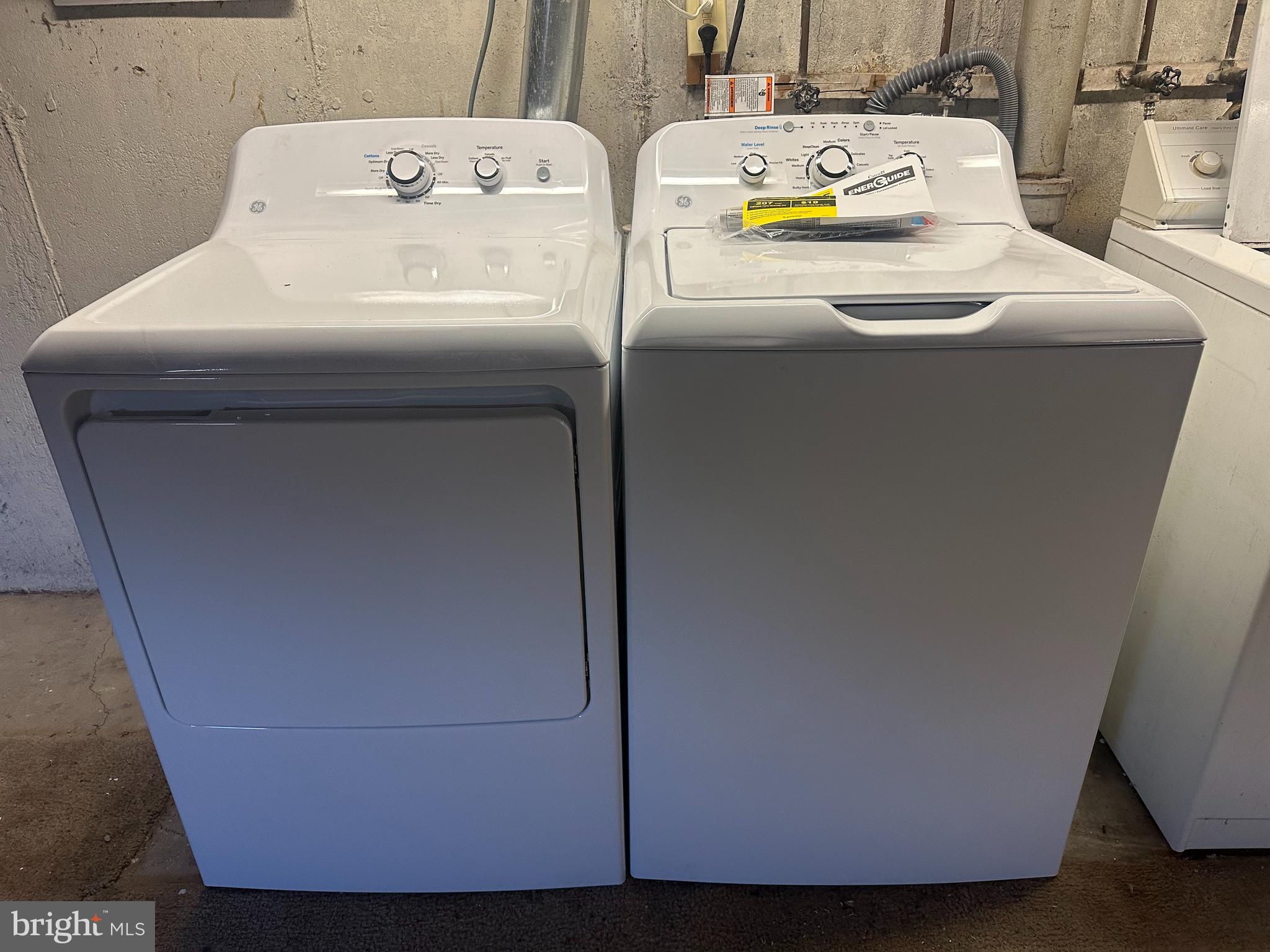 5-7 Thomas Road, Unit 5 Aston, PA 19014 - Photo 11 of 13 a utility room with dryer and washer