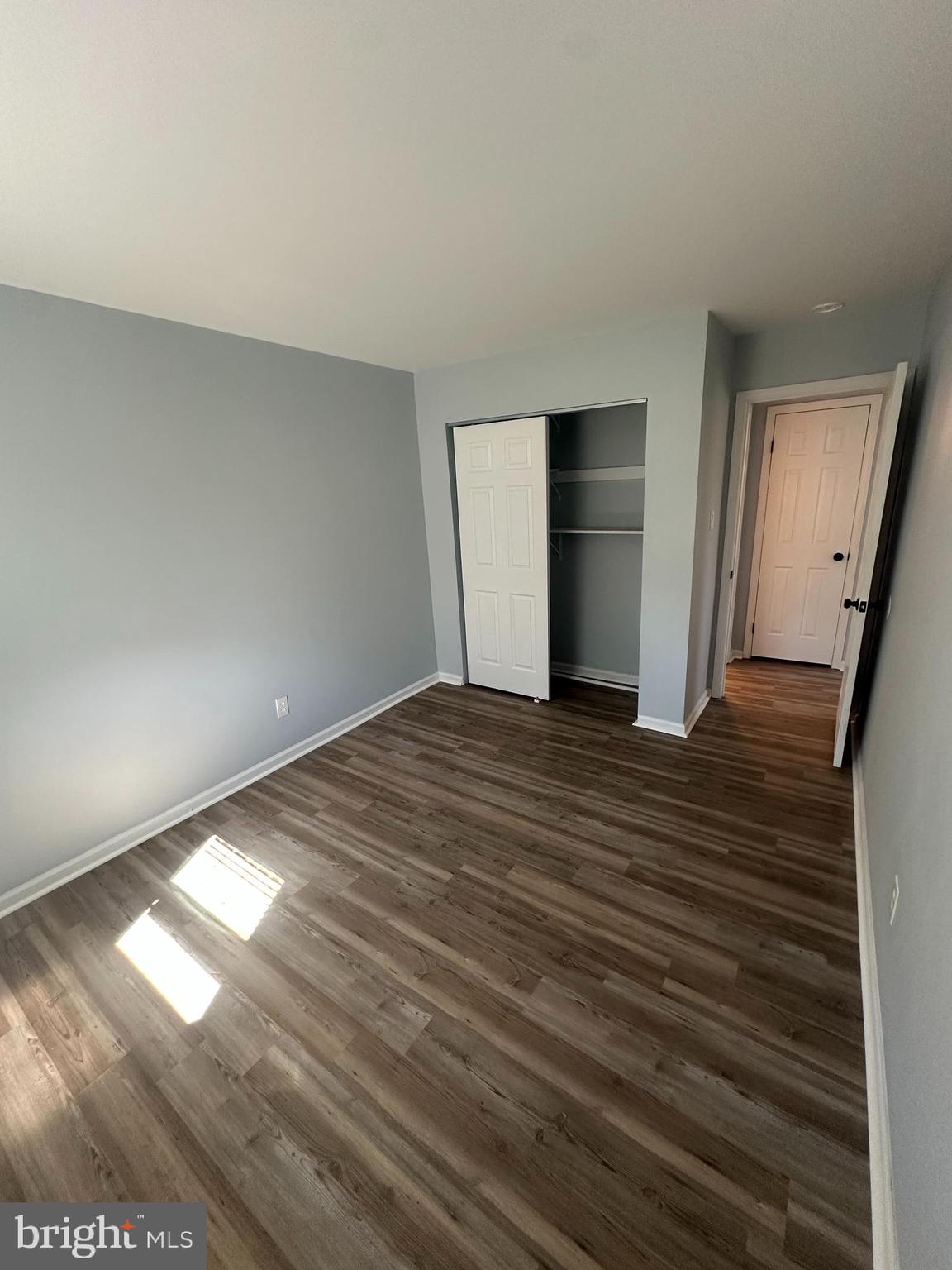 5-7 Thomas Road, Unit 5 Aston, PA 19014 - Photo 9 of 13 a view of empty room with wooden floor