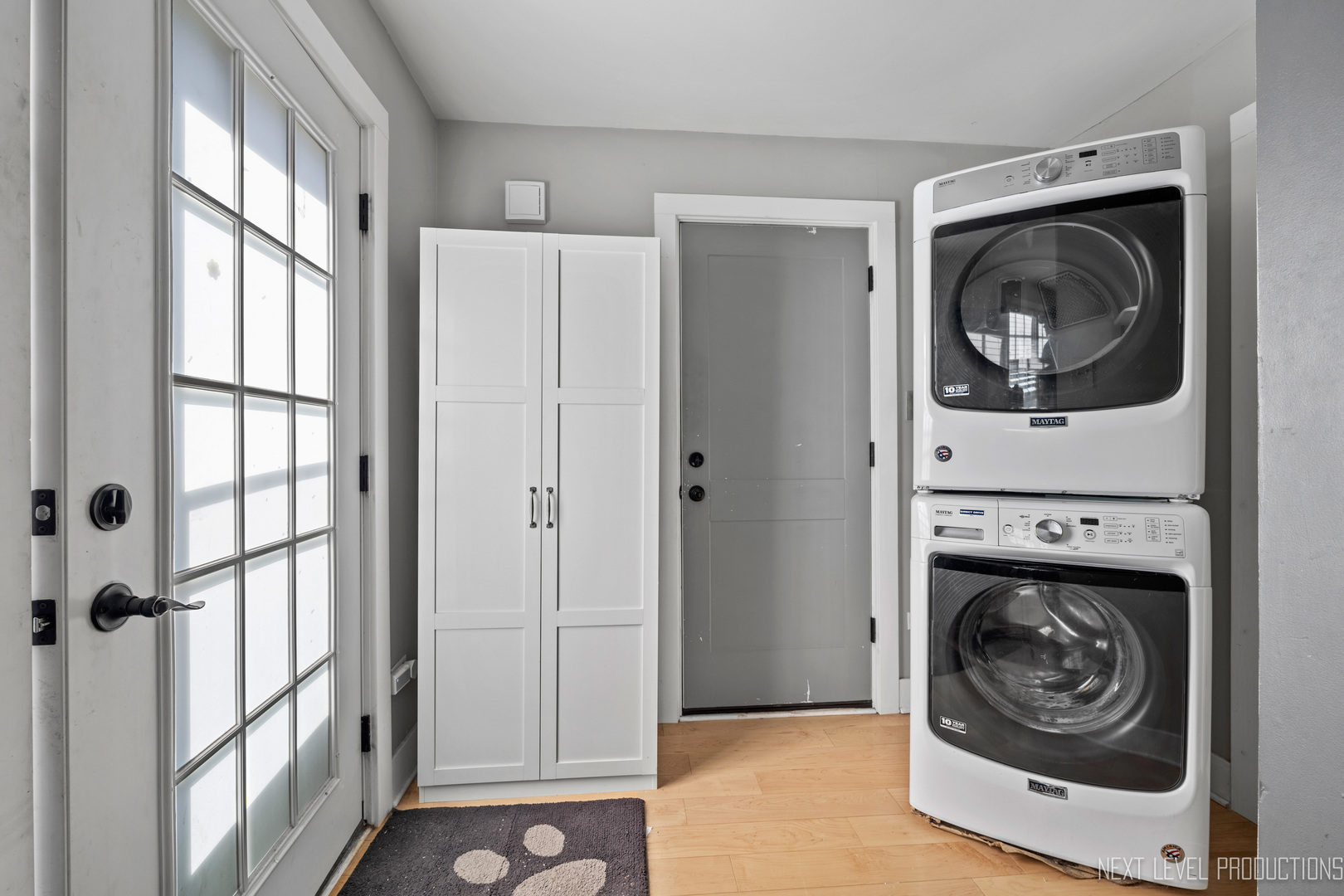 3S520 Batavia Road Warrenville, IL 60555 - Photo 18 of 18 a view of a hallway with washer and dryer