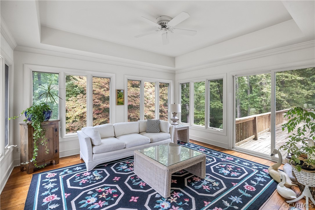 3022 River Hills Lane Midlothian, VA 23113 - Photo 13 of 45 a living room with furniture and a floor to ceiling window