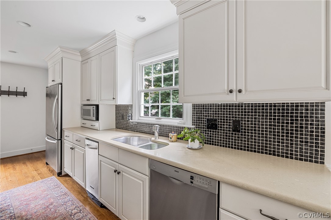 3022 River Hills Lane Midlothian, VA 23113 - Photo 16 of 45 a kitchen with a sink and cabinets
