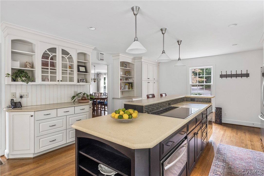 3022 River Hills Lane Midlothian, VA 23113 - Photo 17 of 45 a kitchen with stainless steel appliances granite countertop a sink a stove and a wooden floors