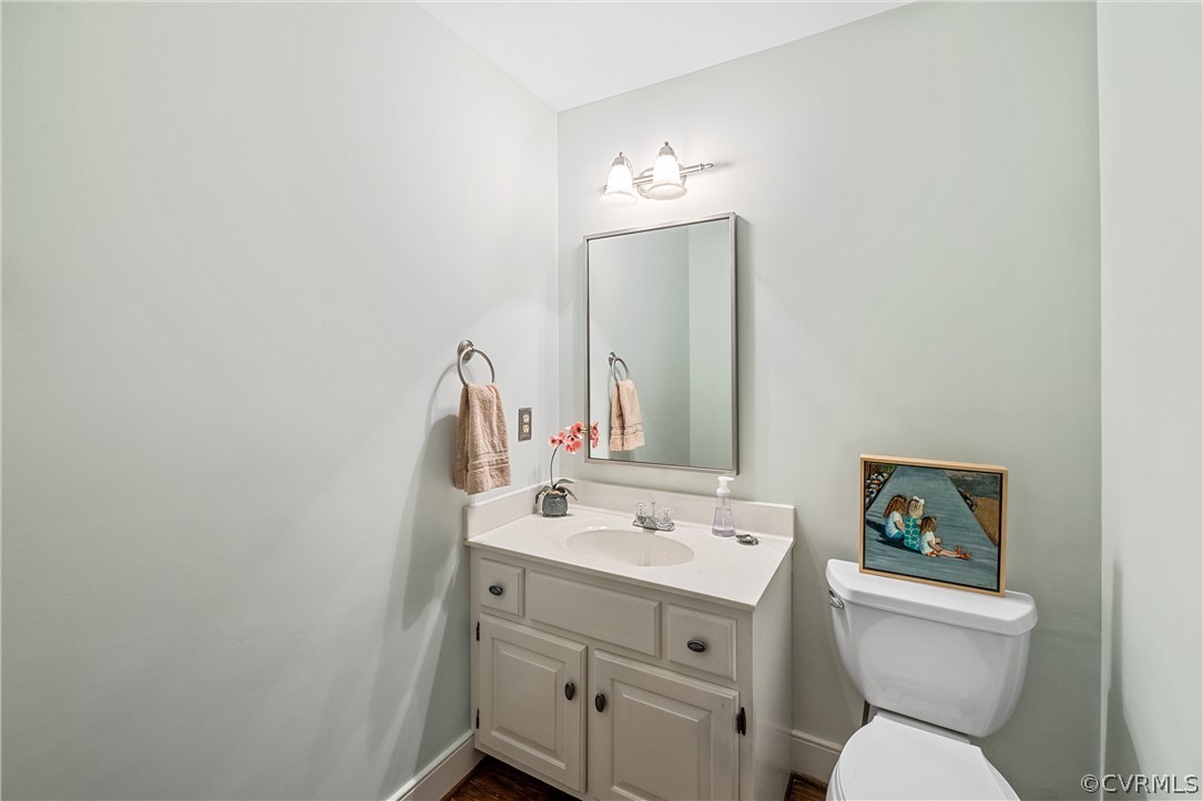 3022 River Hills Lane Midlothian, VA 23113 - Photo 20 of 45 a bathroom with a sink vanity and a toilet