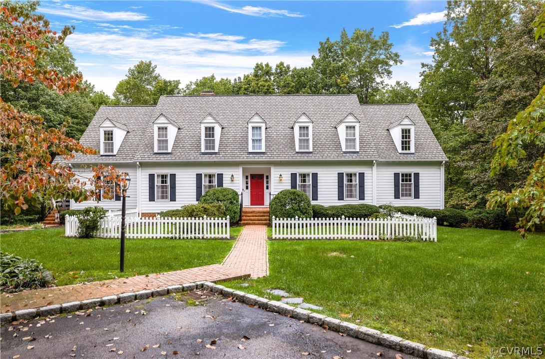 3022 River Hills Lane Midlothian, VA 23113 - Photo 2 of 45 a front view of a house with a yard