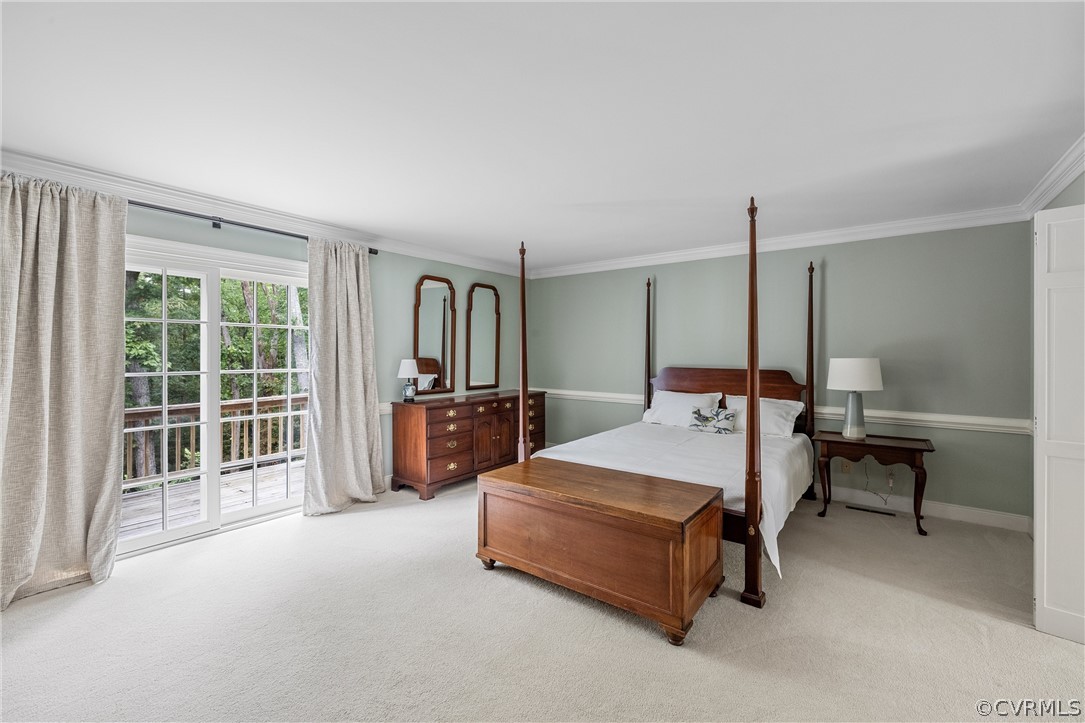 3022 River Hills Lane Midlothian, VA 23113 - Photo 21 of 45 a spacious bedroom with a bed table and chairs