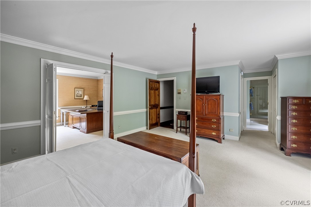 3022 River Hills Lane Midlothian, VA 23113 - Photo 23 of 45 a bedroom with a bed and a television in it