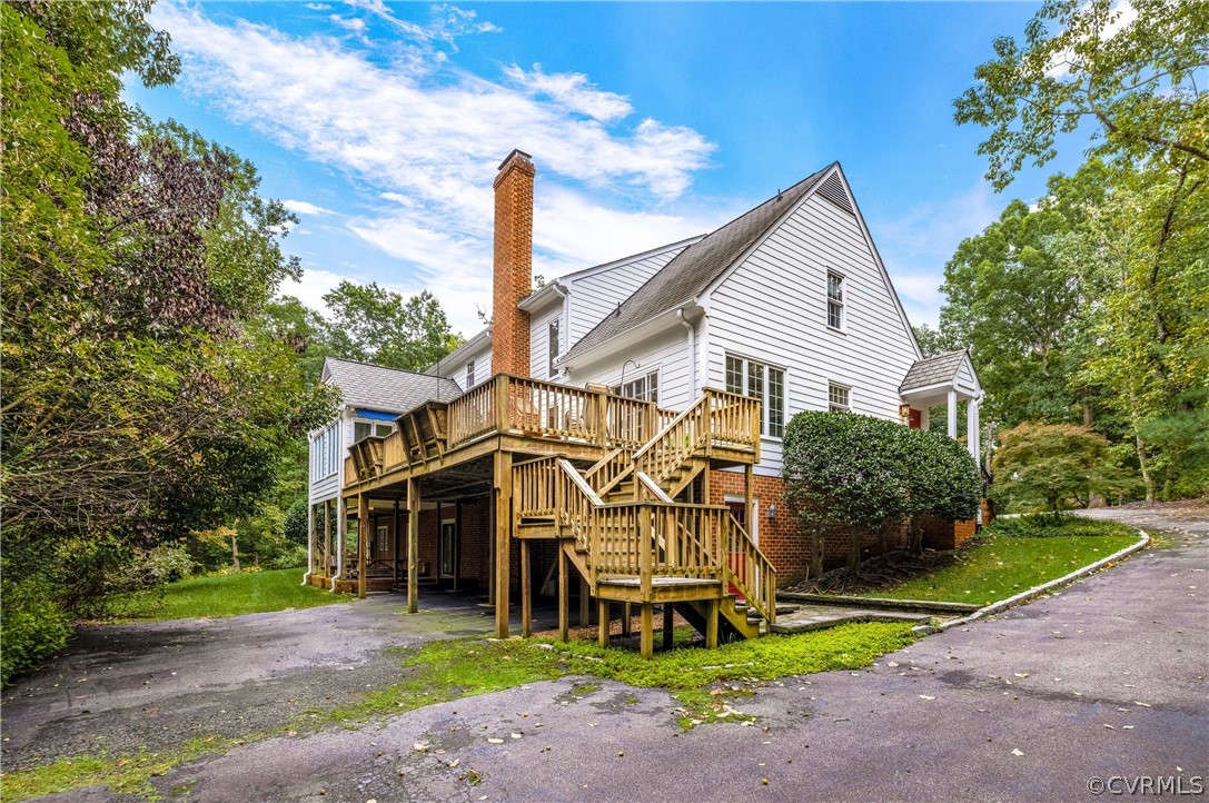 3022 River Hills Lane Midlothian, VA 23113 - Photo 41 of 45 a front view of a house with garden