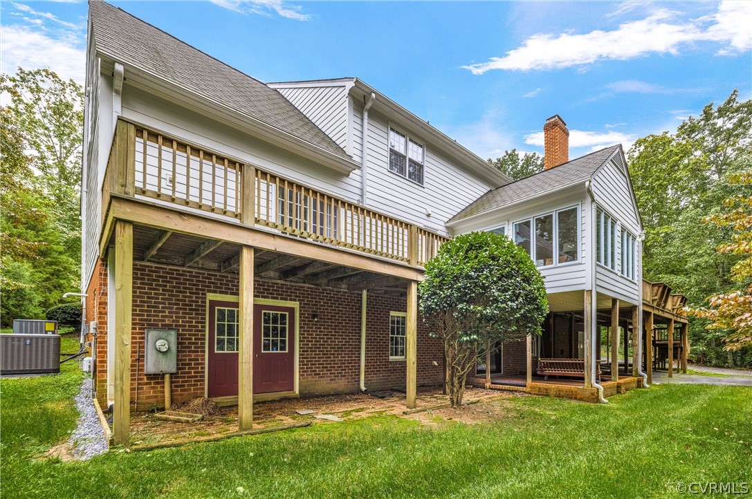 3022 River Hills Lane Midlothian, VA 23113 - Photo 44 of 45 front view of a house with a yard