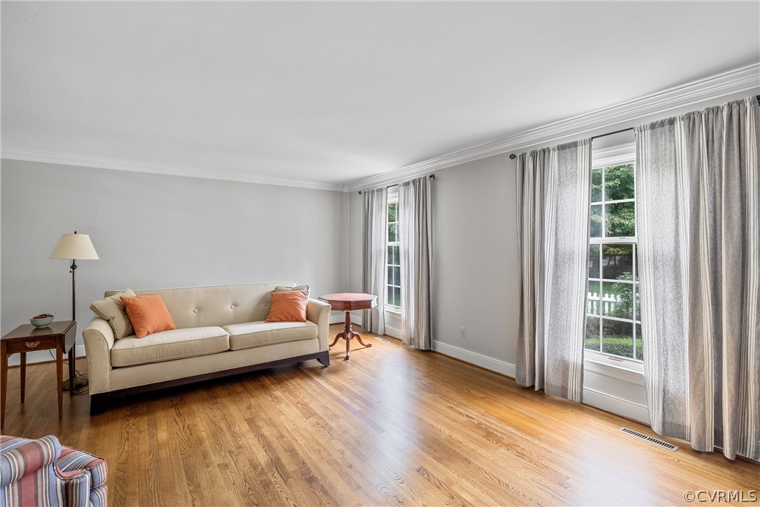 3022 River Hills Lane Midlothian, VA 23113 - Photo 8 of 45 a living room with furniture and a large window