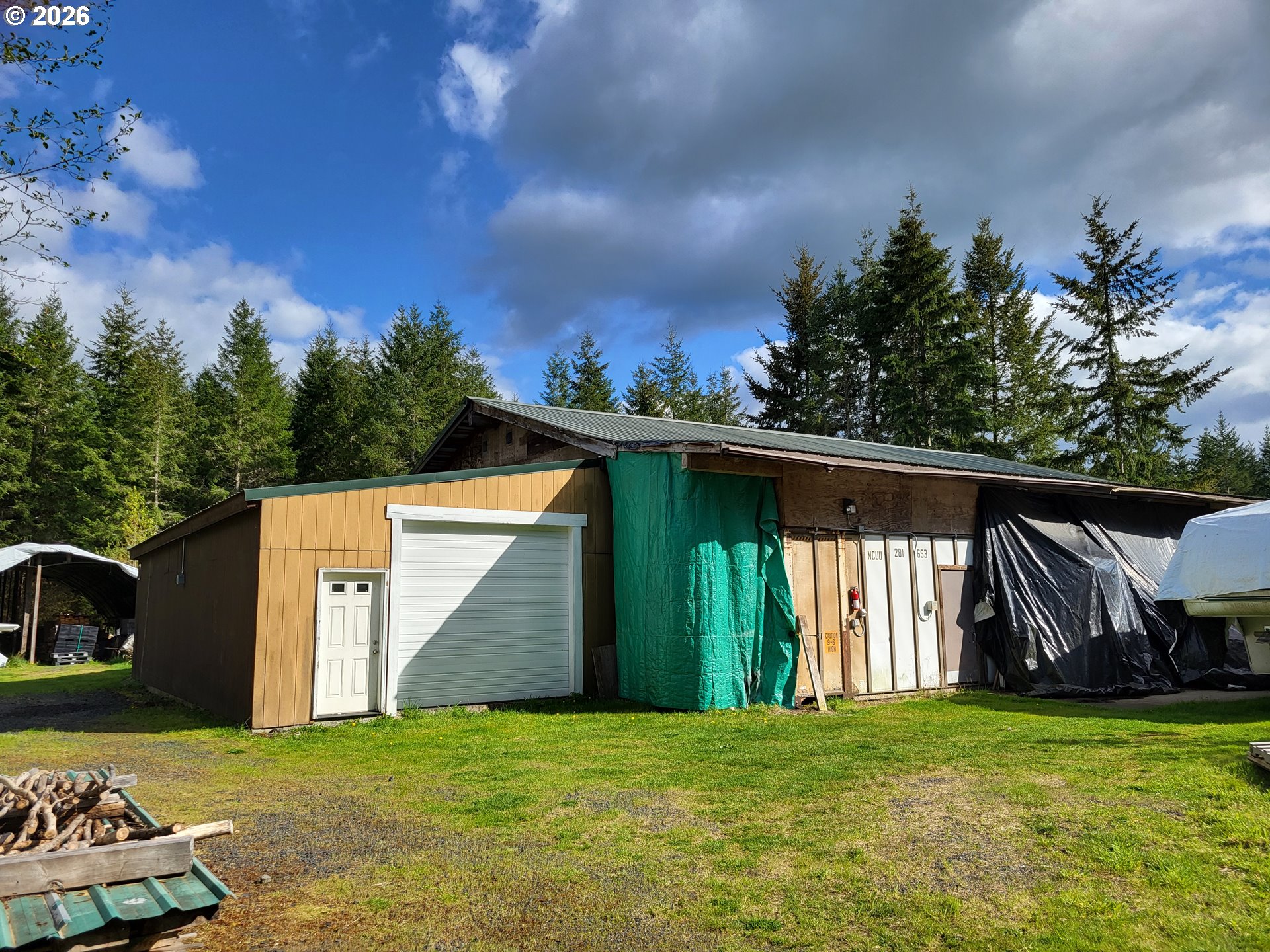 505 State Highway Winlock, WA 98596 - Photo 10 of 13 a view of a garden with a bench