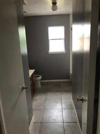 a bathroom with a toilet