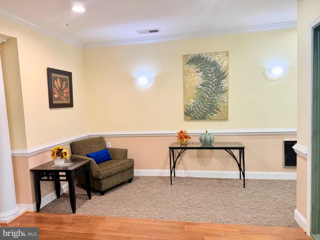 a room with furniture and a wooden floor