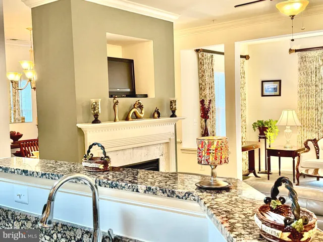 a bedroom with furniture and natural light