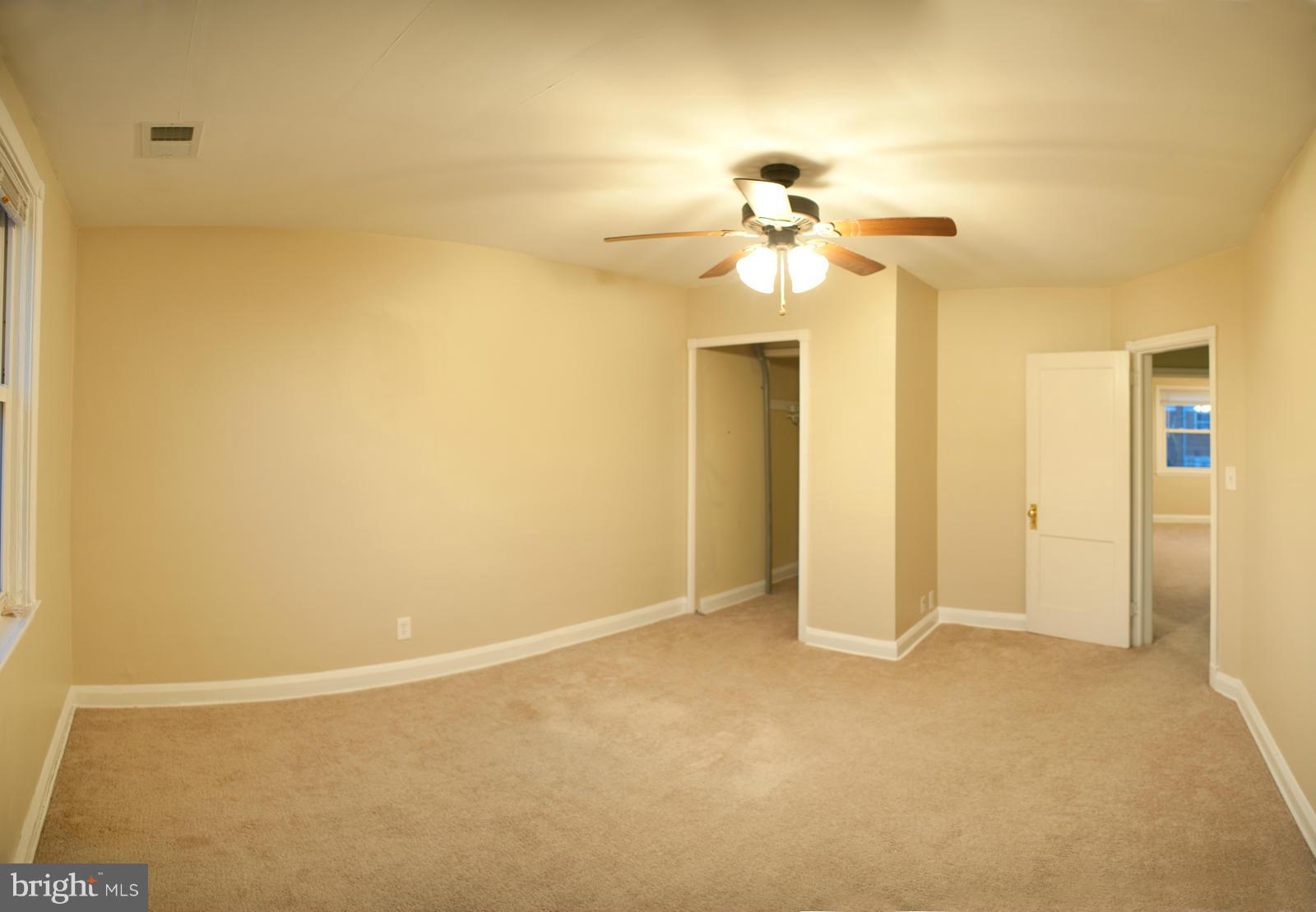 1536 Kingsway Road Baltimore, MD 21218 - Photo 13 of 20 a view of a chandelier fan in a room