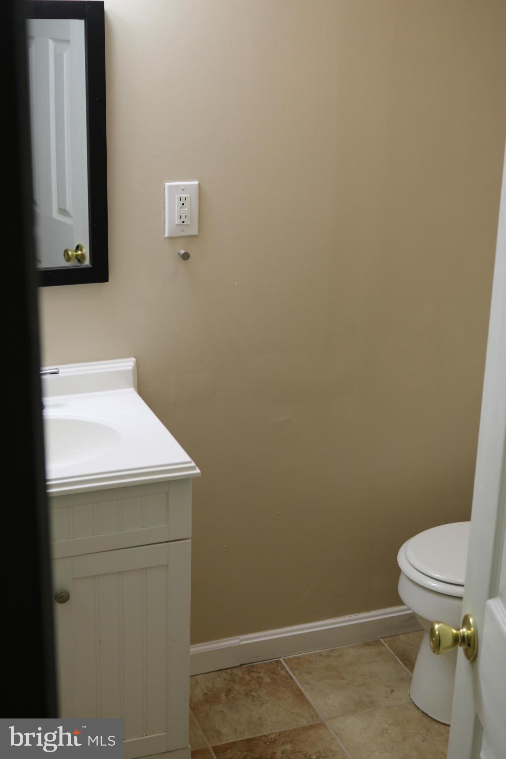 1536 Kingsway Road Baltimore, MD 21218 - Photo 17 of 20 a bathroom with a toilet