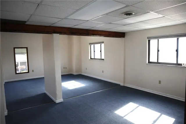 an empty room with windows