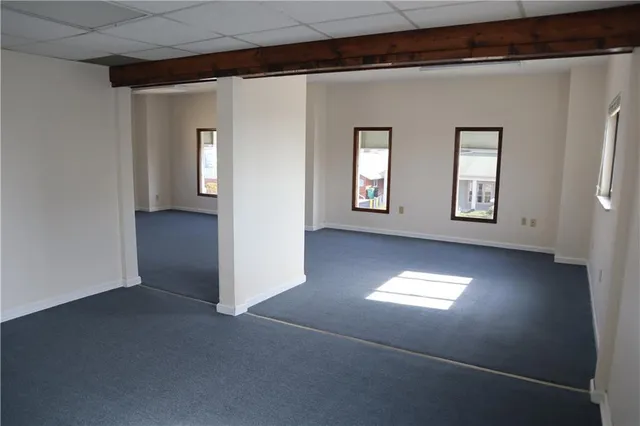 an empty room with windows
