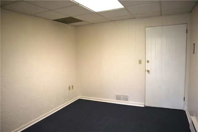 a view of a room has an empty room