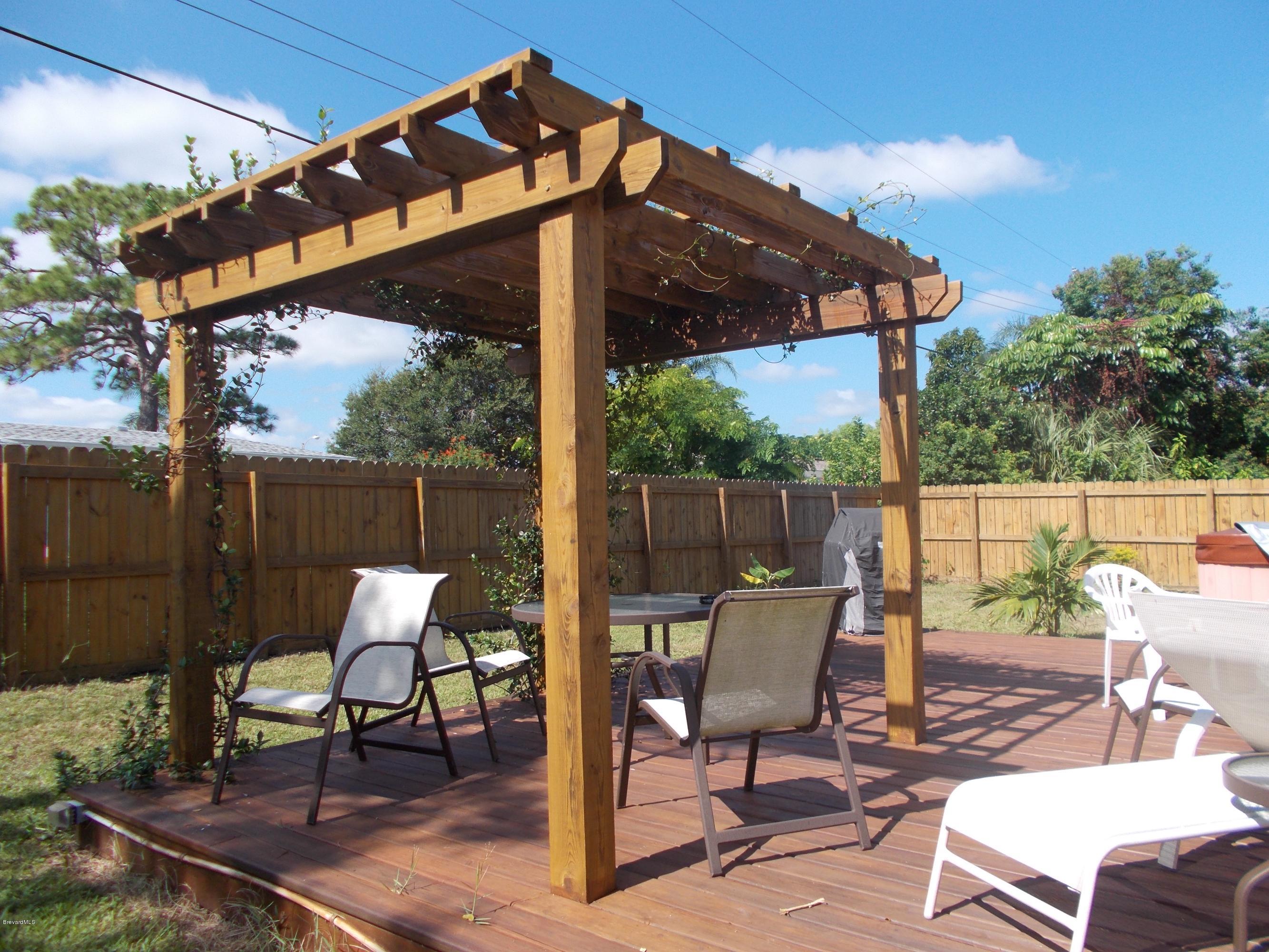 2938 Kosuth Road Northeast Palm Bay, FL 32905 - Photo 14 of 16 WOODEN DECK AND ARBOUR